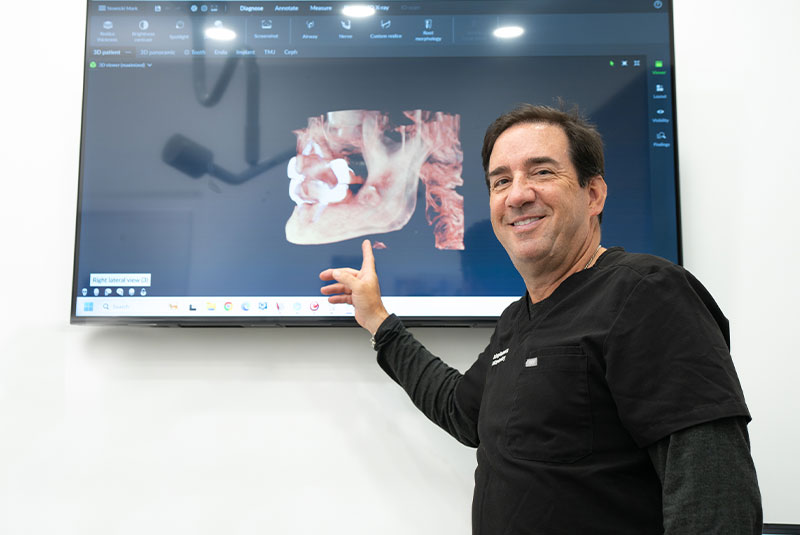 Doctor Pointing to x-ray