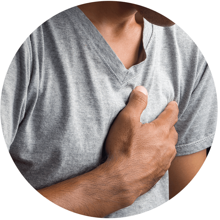Man holding chest in pain